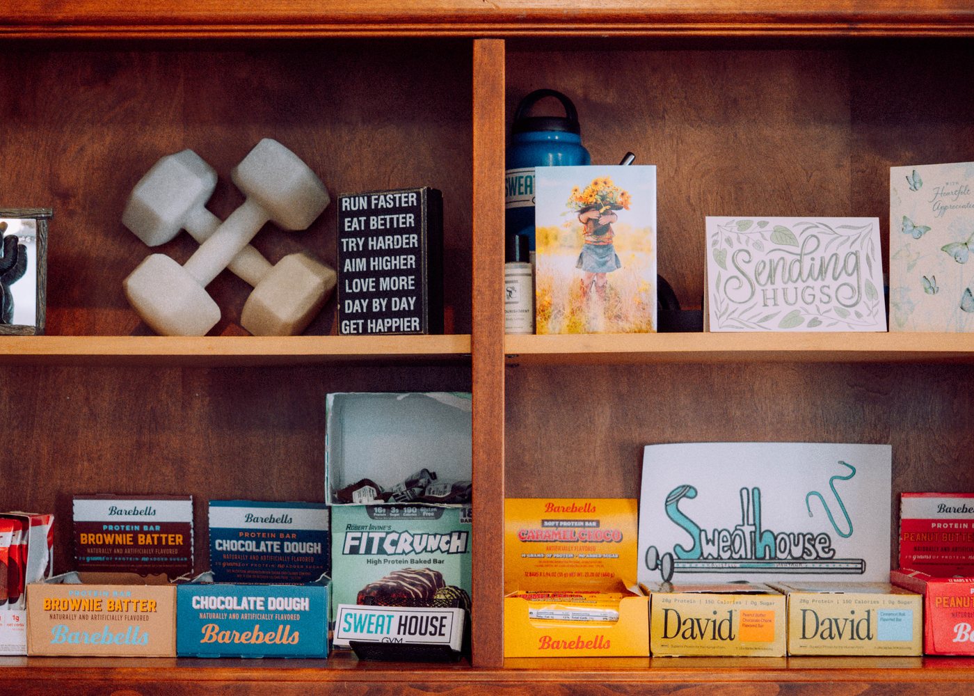 The retail shelf beside the desk